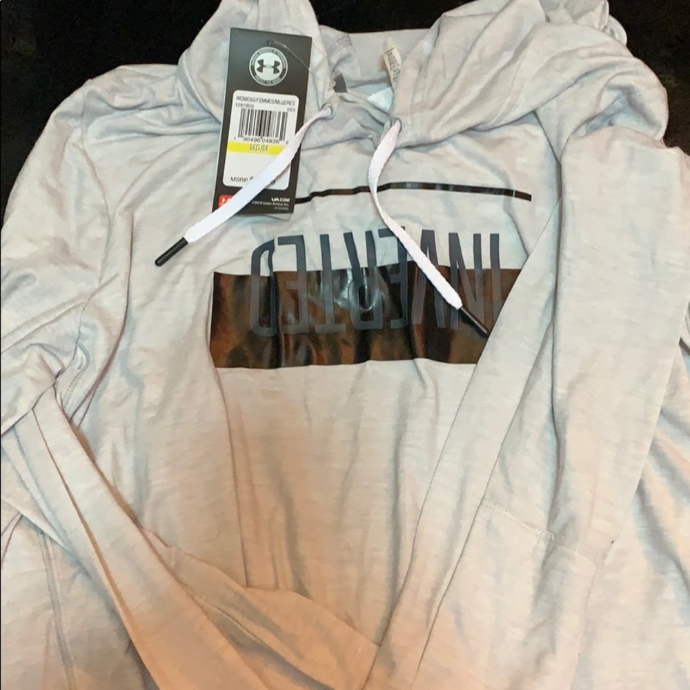 Under armour womans athletic top with hood.